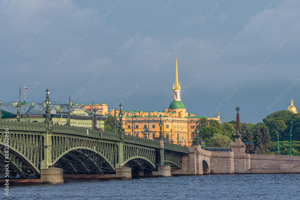 Saint Petersburg in cloudy weather. The bridge across the Neva in Sankt Petersburg. Cities of Russia. The rivers and canals of St. Petersburg.
