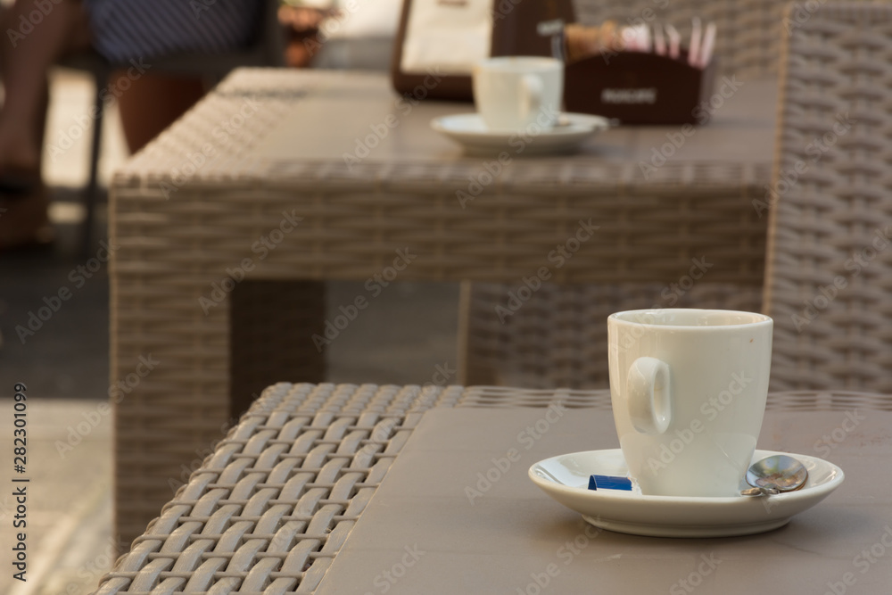 Close Up of Empty Cup of Coffee on a Table of an Italian Bar Close Up of Empty Cup of Coffee on a Table of an Italian Bar