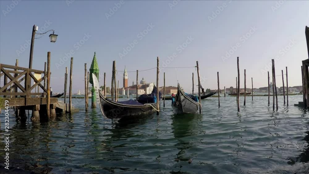 Venice Italy gondolas parked on a sunny day Venice Italy gondolas parked on a sunny day