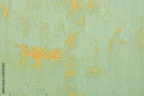 Rusty green painted metal surface texture background
