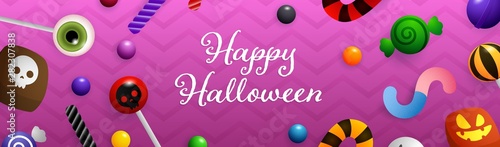 Happy Halloween lettering with candies and sweets