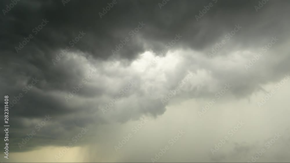 Low stormy clouds in the blue sky. Skyscape timelaps. Low stormy clouds in the blue sky. Skyscape timelaps.