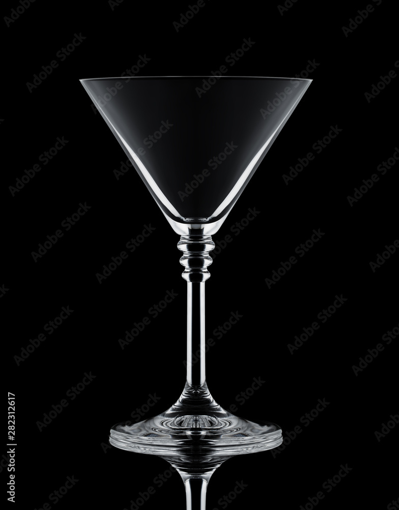 one crystal martini glass on a black background white contours one crystal martini glass on a black background white contours
