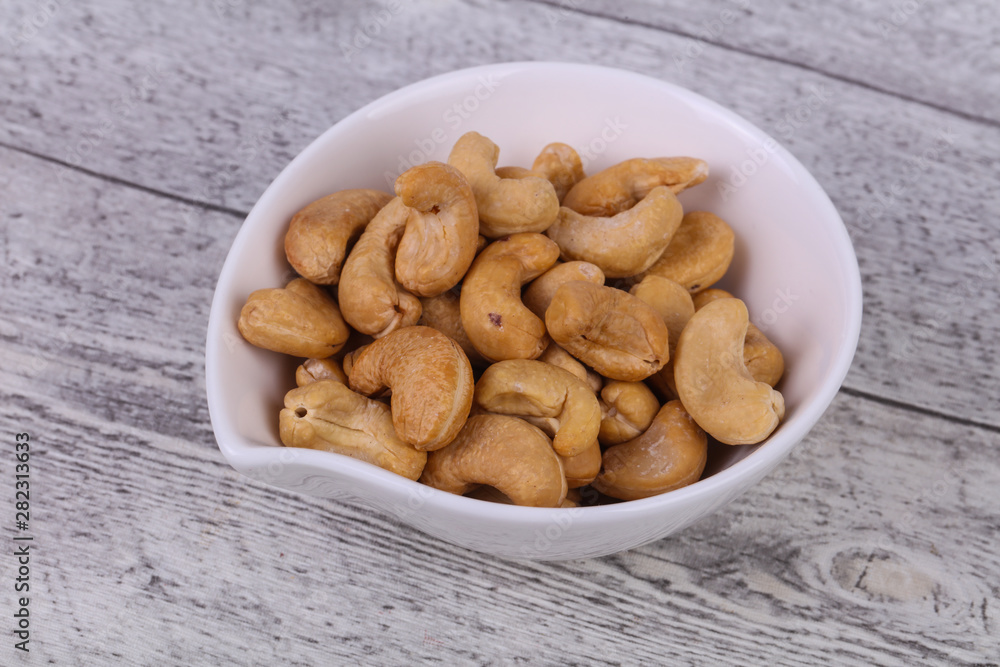 Cashew nuts heap in the bowl Cashew nuts heap in the bowl