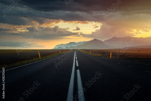 Typical icelandic landscape with empty road and scenic nature