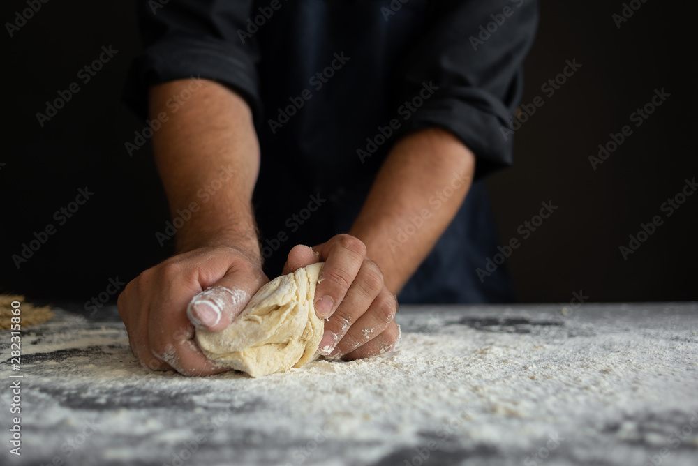 the process of kneading the dough with hands, place for text