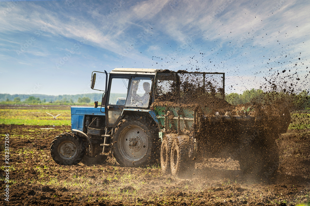 Fototapeta premium Field tractor at work