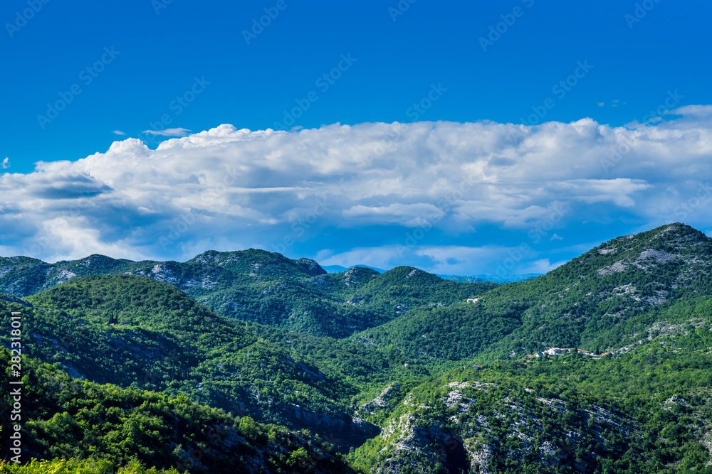 Montenegro, Forested mountains and valleys forming the black mountains of the country in skadar lake national park from above