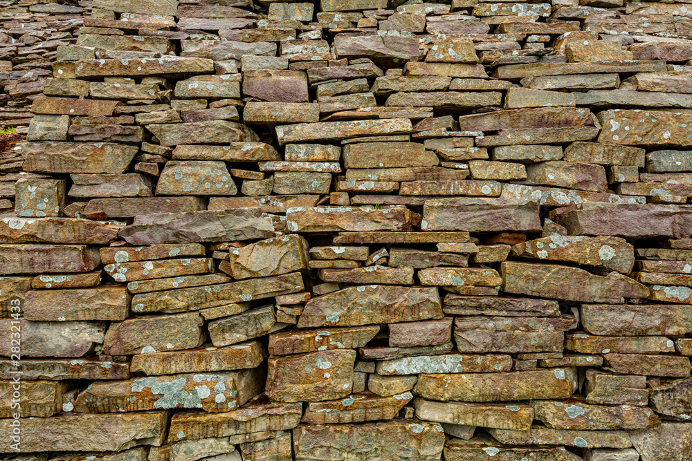 Fototapeta premium Close up of a natural limestone wall, limestone texture, geosites and geopark, spring day in the countryside in county Clare in Ireland