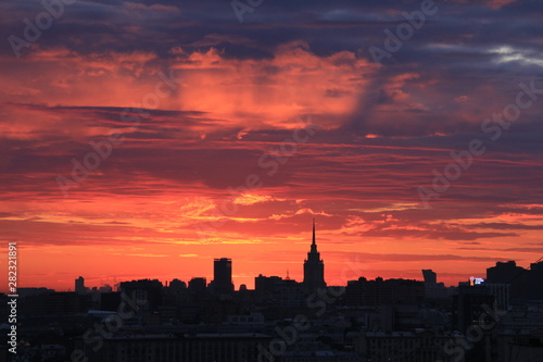 Moscow city silhouettes and symphony of bright sunset colours © Irina Solonina