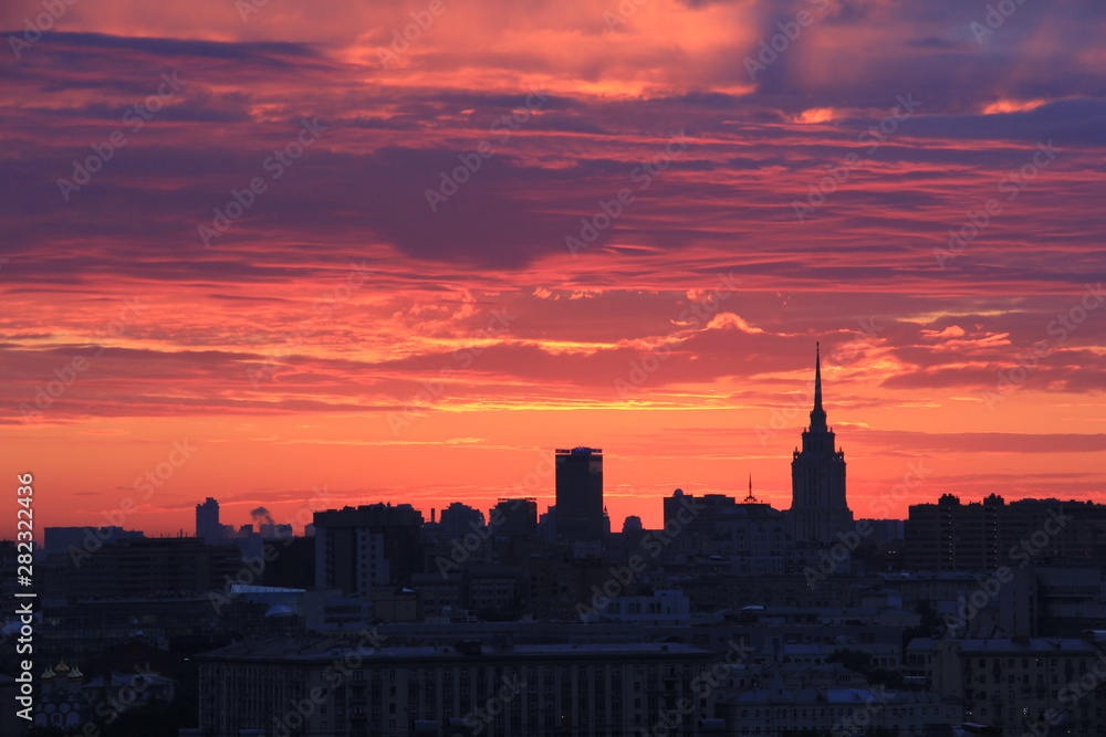 Moscow city silhouettes and symphony of bright sunset colours