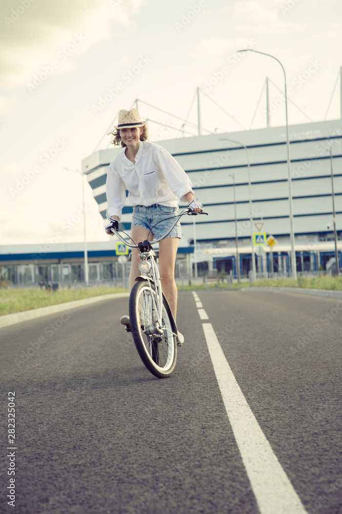 young woman biking