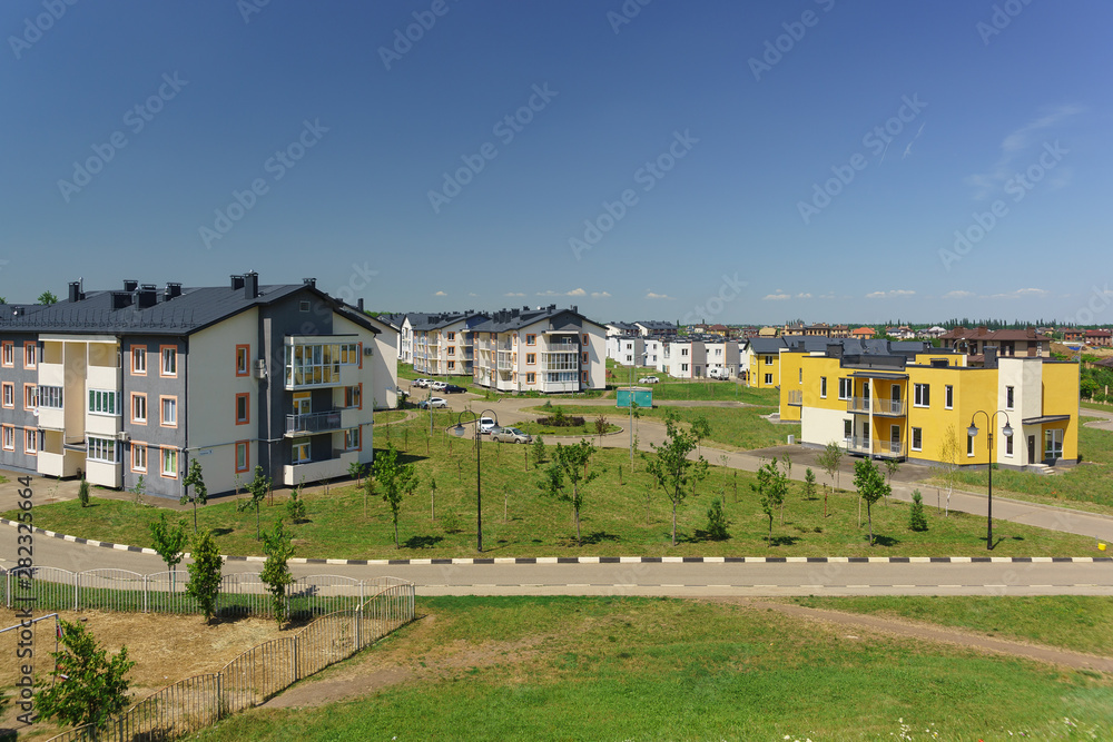 Low-rise apartment buildings in the new district of Krasnodar on the street Schumann