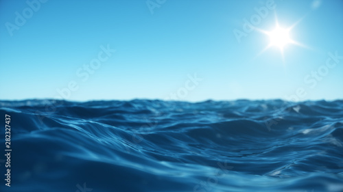 Sea wave low angle view. Ocean water background. View from below, view of a clear blue sky with the sun. Sea or ocean wave close-up view. Beautiful blue clean water. 3D rendering