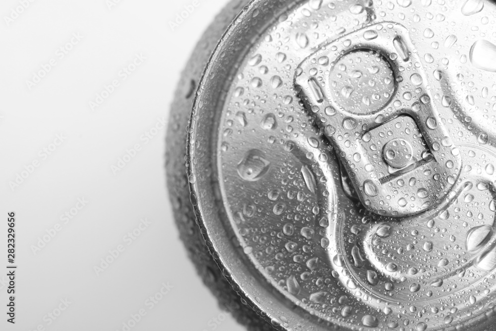 Wet closed can on white background, closeup Wet closed can on white background, closeup