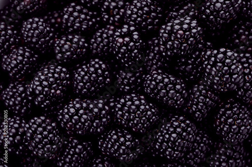 Tasty ripe fresh blackberries with as background  closeup view