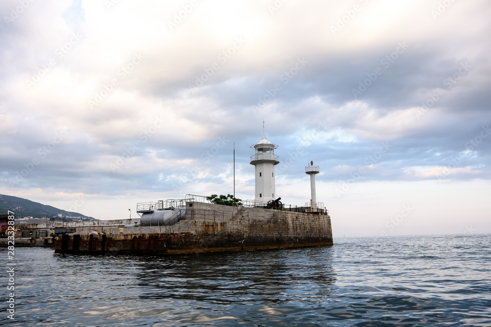 Lighthouse on the Black Sea coast. Mountain view from the sea