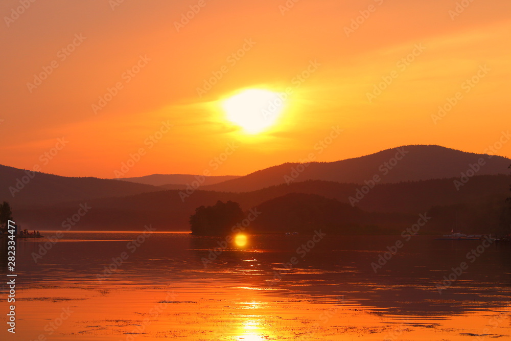 Wonderful sunset on the lake. Background. Landscape.