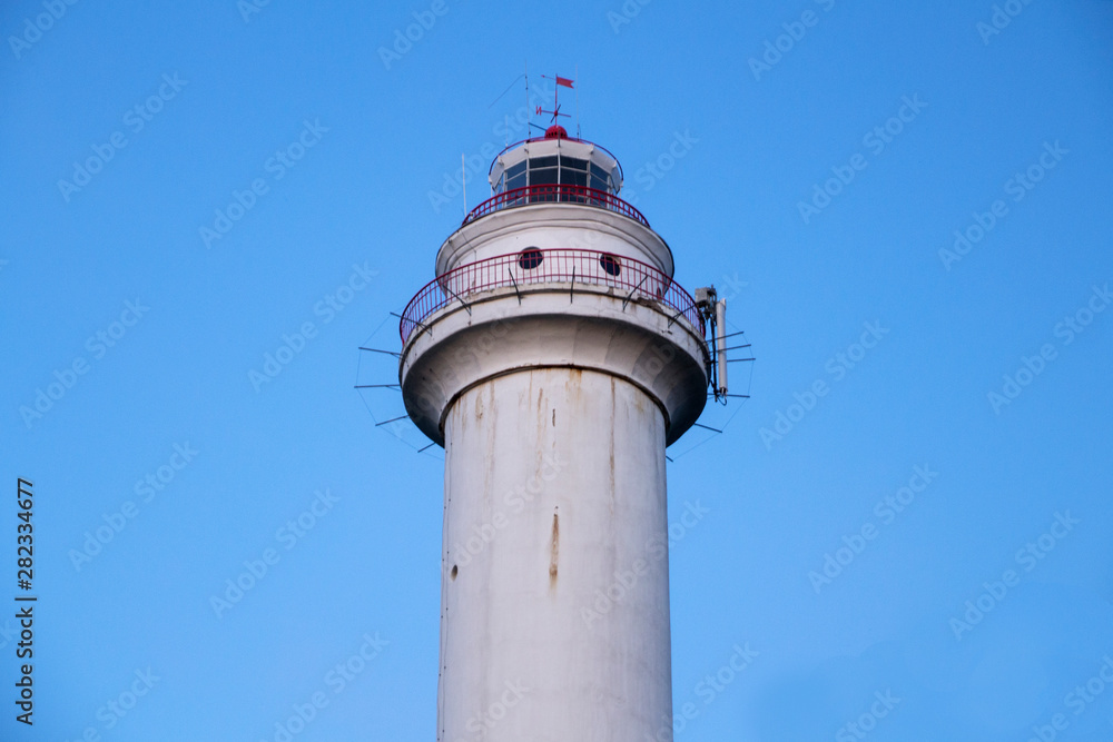 the top of the old lighthouse against the sky