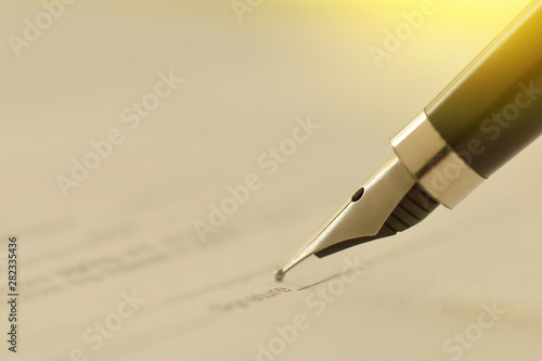 ink pen fountain signing of the document the contract agreement