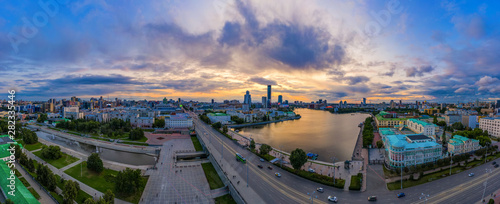 The city center of Ekaterinburg, Skyscrapers behind city pond. Russia. Aerial Photography