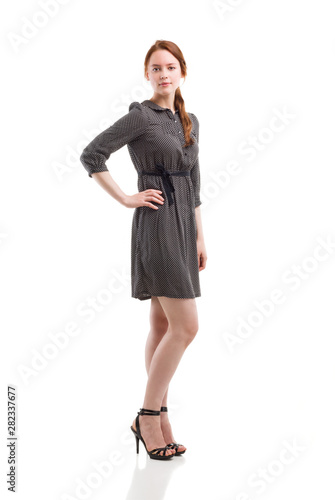 Full length portrait of a confident young female