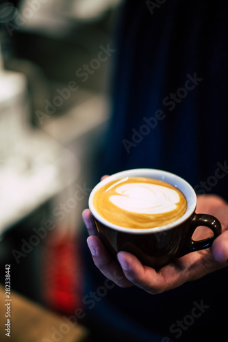 cup of coffee in hands