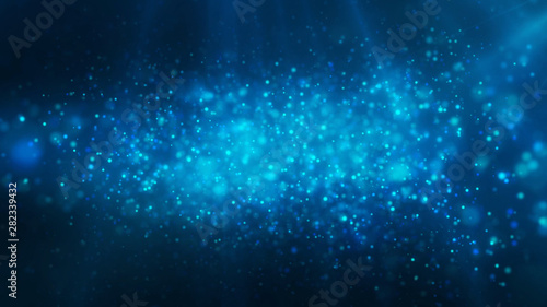 Blue shiny glowing glitter background. Dust  particles blue  cyan colored on dark background. Christmas  festive  greeting pattern.