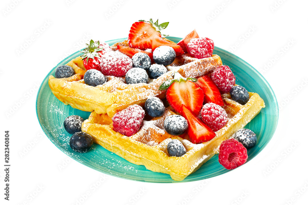 waffles with berries isolated on white