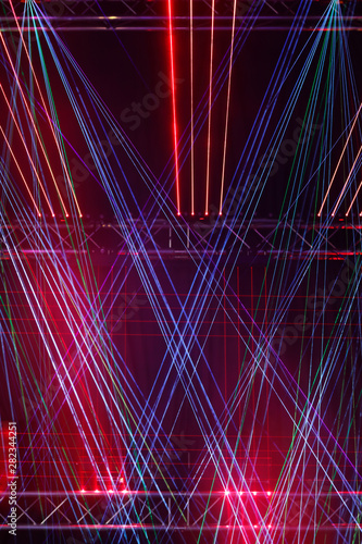 Fototapeta Naklejka Na Ścianę i Meble -  multicolored laser beam stage lights
