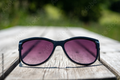 Fototapeta Naklejka Na Ścianę i Meble -  purple sunglasses