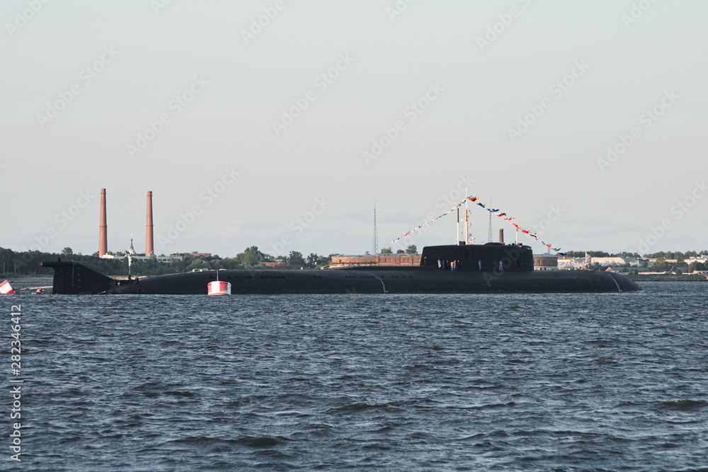 Large Russian nuclear submarine stands at the parade in Kronstadt at the parade