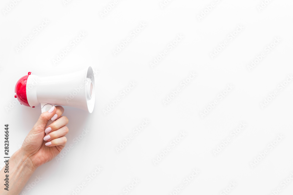 Attract attention with megaphone on white background top view copyspace Attract attention with megaphone on white background top view copyspace