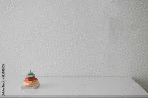 baby nursery with colorful wooden toy