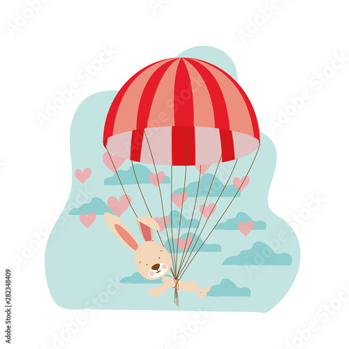 Fototapeta Naklejka Na Ścianę i Meble -  cute bunny with parachute in background clouds