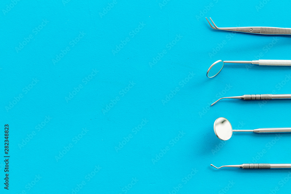 dentist desk with instruments on blue background top view mock-up dentist desk with instruments on blue background top view mock-up