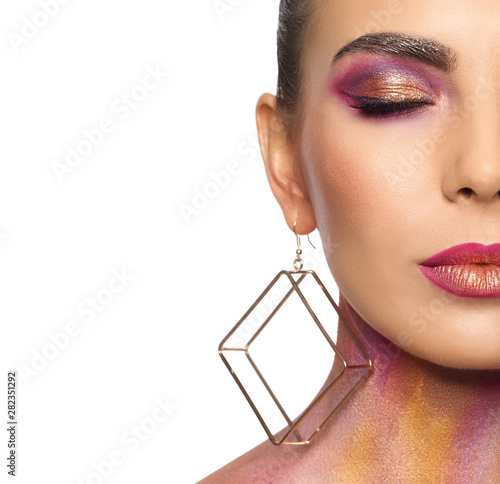 Wallpaper Mural Sexy young woman with glitter makeup on white background, closeup