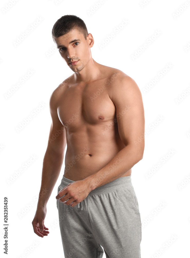 Young man with slim body on white background