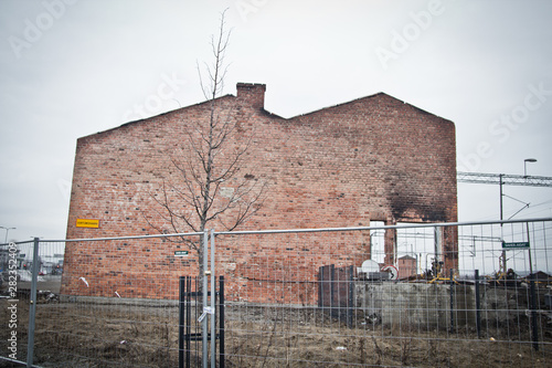urban view autumn cold bad weather cloudy sad landscape train railroad blue door snow winter house home barrel