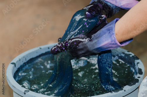 Cotton dye with hand. photo