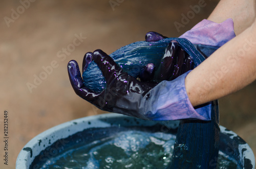 Cotton dye with hand. photo
