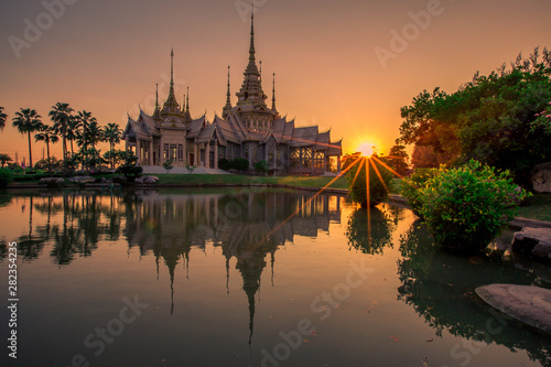 Wallpaper Wat Lan Boon Mahawihan Somdet Phra Buddhacharn(Wat Non Kum)is the beauty of the church that reflects the surface of the water, popular tourists come to make merit and take a public photo