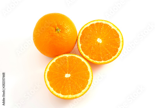 Orange is a fruit that contains vitamins. C. high in orange  cut in half With a shadow on a white background