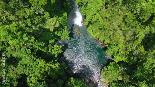 Aerial descending on Tinago waterfalls in the philippines on the island of Mindenao photo