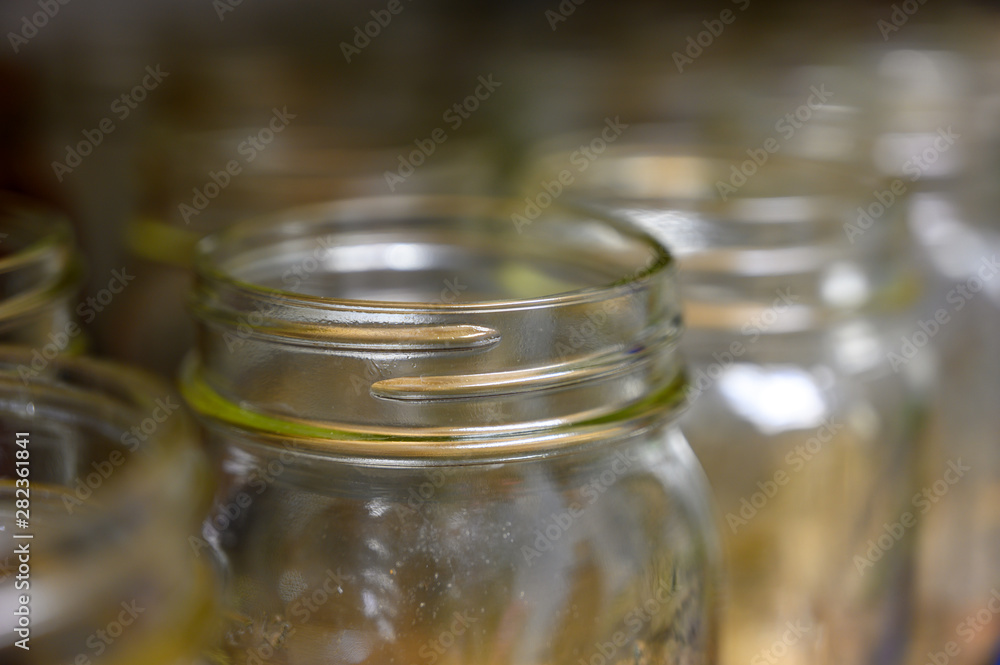 Empty glass canning jars for pressure cooking preservation of food Empty glass canning jars for pressure cooking preservation of food