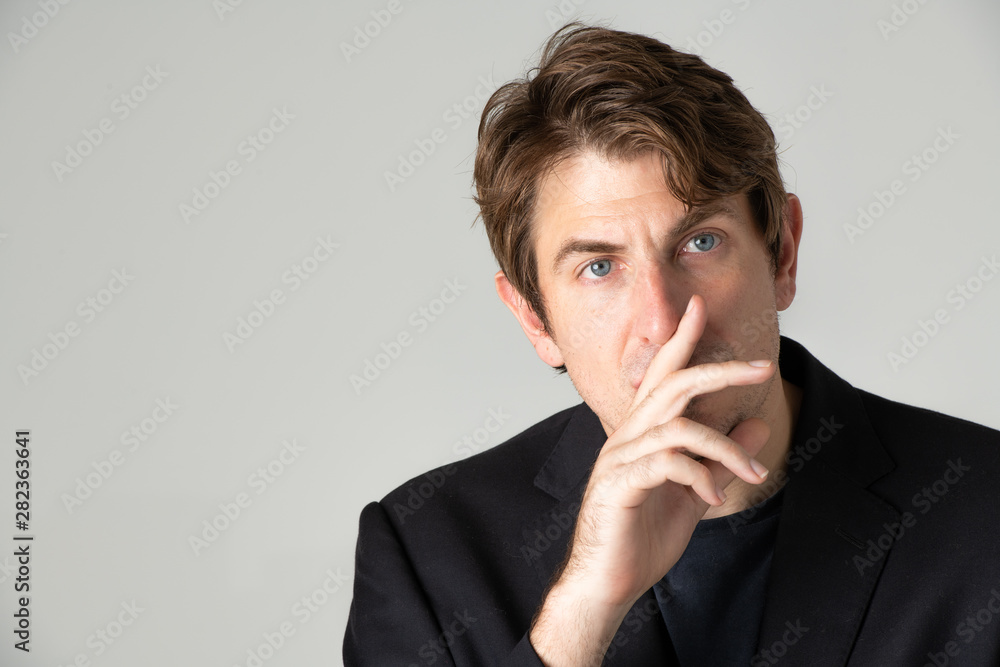 Businessmen, analyze data and consult various issues In the office that has a natural and gray background Businessmen, analyze data and consult various issues In the office that has a natural and gray background