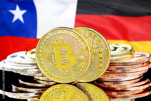 Concept for investors in cryptocurrency and Blockchain technology in the Chile and Germany. Bitcoins on the background of the flag Chile and Germany.