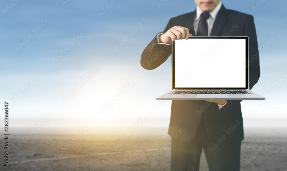 Man using his laptop in a hand