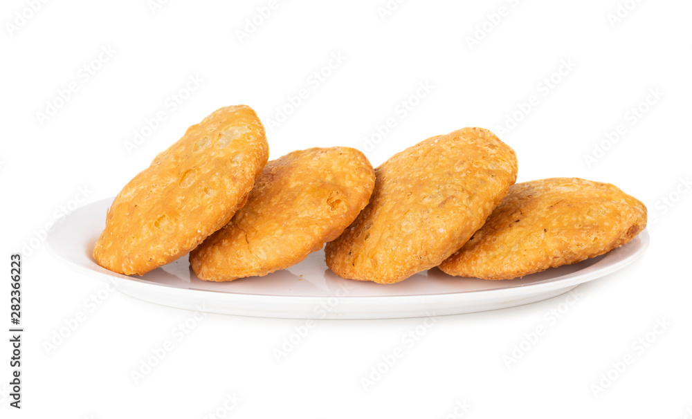 Indian Popular Spicy Snack Kachori Also Know as Kachodi, Katchuri And Fried Dumpling on White Background Indian Popular Spicy Snack Kachori Also Know as Kachodi, Katchuri And Fried Dumpling on White Background