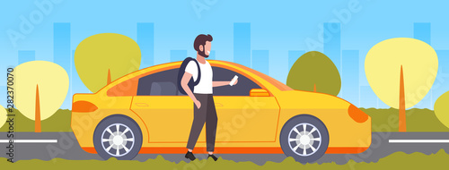 casual man using smartphone mobile app guy ordering yellow cab taxi rent car sharing concept transportation service cityscape background flat full length horizontal
